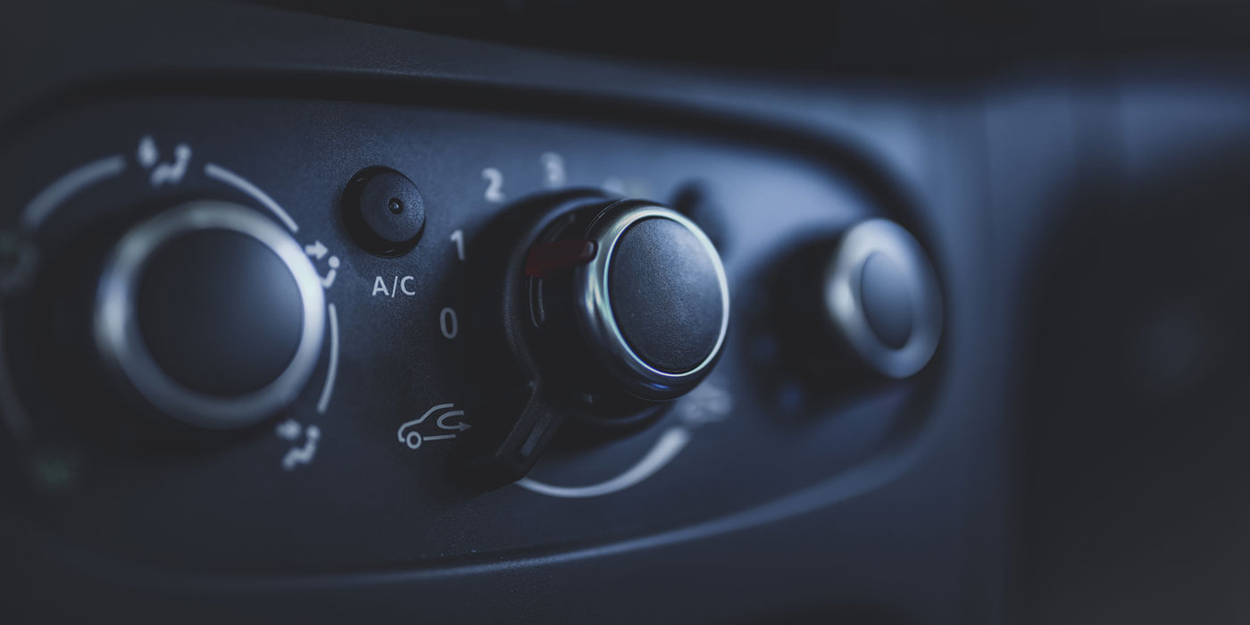 air recirculation button on vehicle dashboard