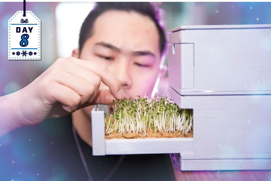 jonathan mui, nait grad and founder of agriolabs, with fresh microgreens