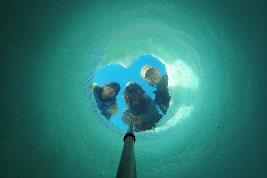 selfie through a seal hole in the arctic