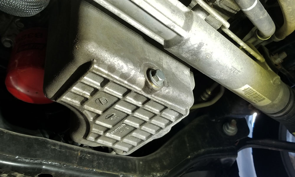 oil sump on underside of a vehicle