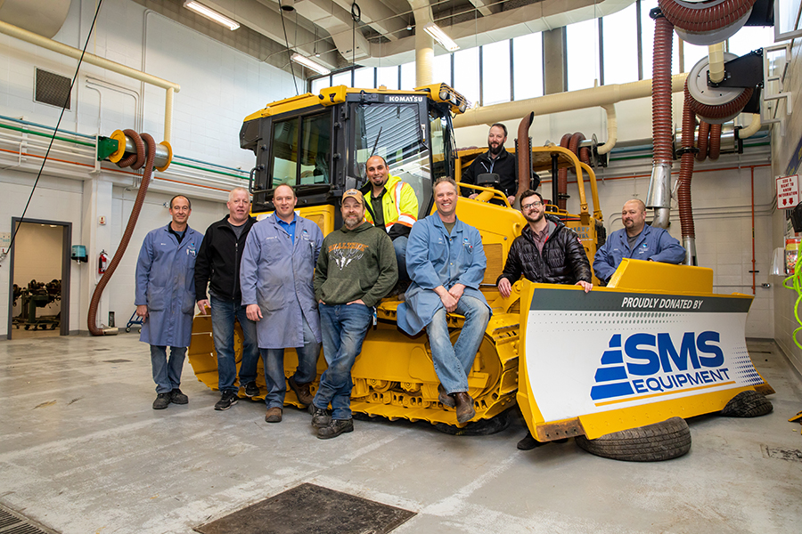 SMS tractor donation to heavy equipment tech program at NAIT
